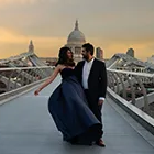 Romantic maternity shoot on Millennium Bridge with St. Paul's; perfect pregnancy photo for a maternity photoshoot.